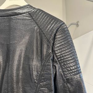 Faux Leather Jacket. Brand: Cotton On. Distressed look. Worn. Good condition.